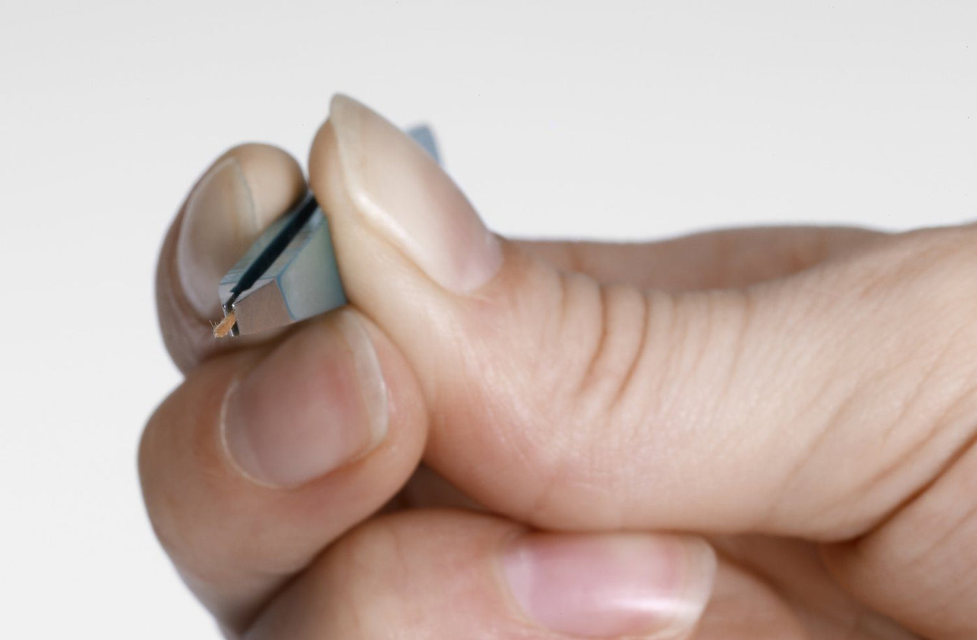 Removing a Splinter With Tweezers